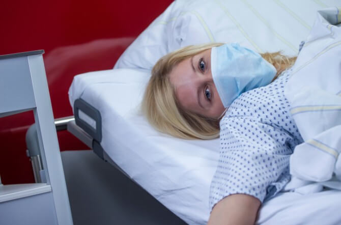 female patient in hospital quarantine