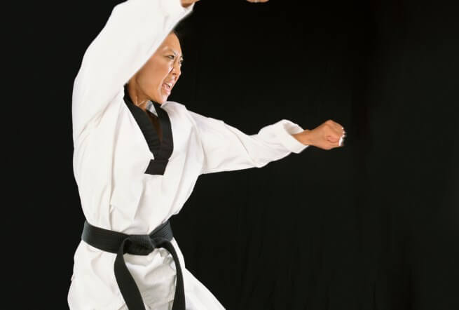 Young Woman in Karate Pose