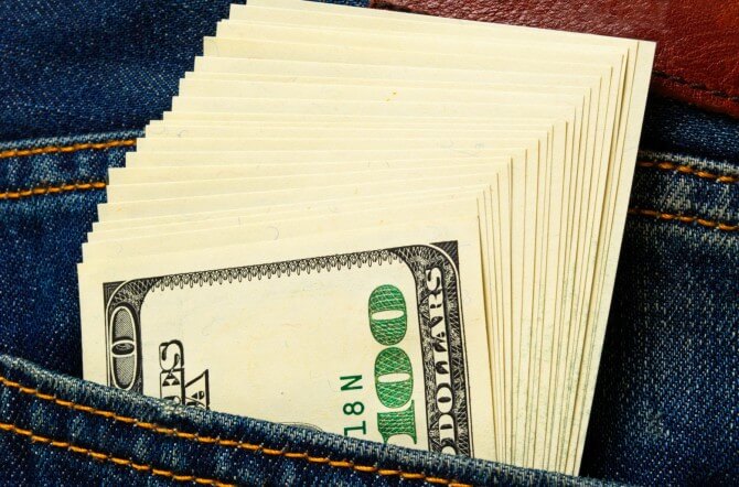 Hundred dollar bills in pocket