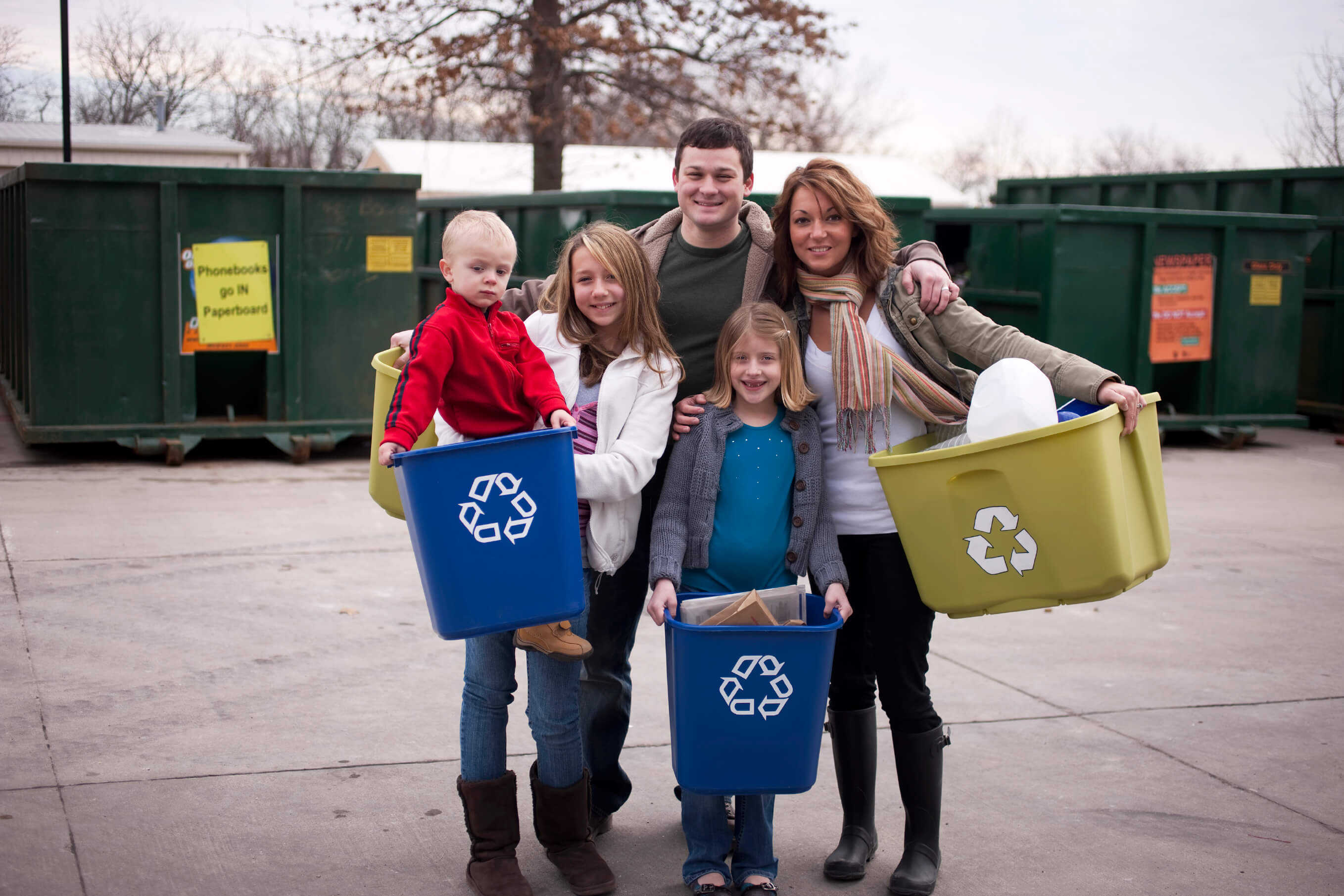 Family at a recycling facility