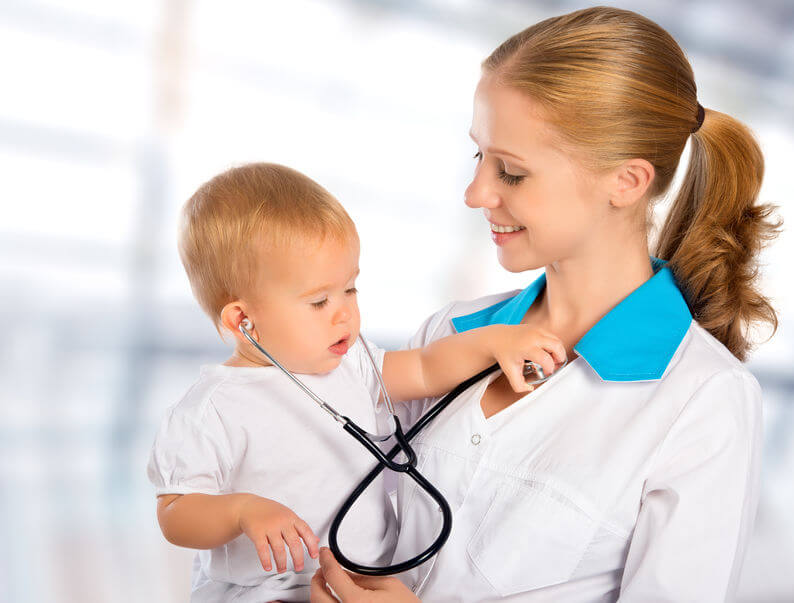 doctor holding baby