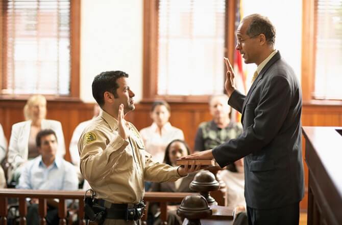 Man being sworn in to testify