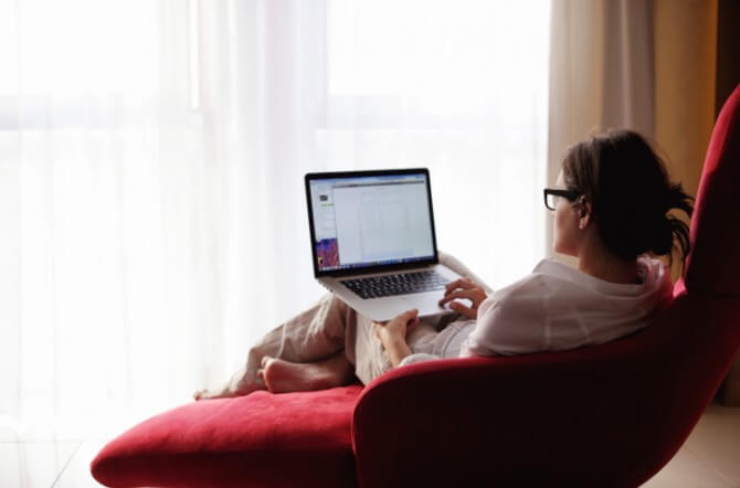 woman using a laptop computer at home