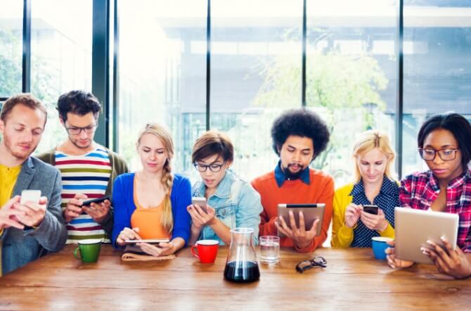 Multiethnic Group of People Social Networking at Cafe
