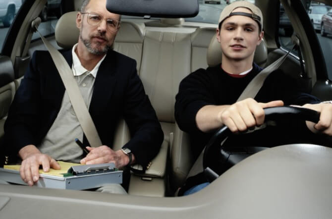 teen driver with instructor